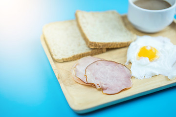 Breakfast set on blue background.  Food concept
