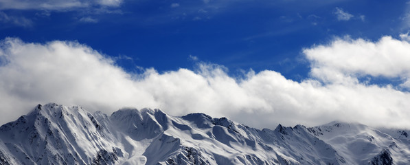 Winter snow mountains at nice sunny day