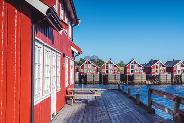 View of the city of Svolvaer on the Lofoten islands, beautiful bright landscape, traditional red houses of Rorbu