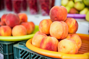 Ripe organic peaches for sale in market