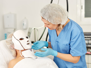 Positive girl expects plastic surgery in clinic