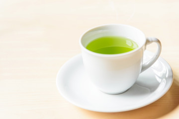 hot green tea on the table