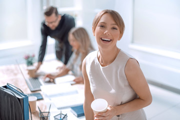 Fototapeta premium young business woman on the background of the office