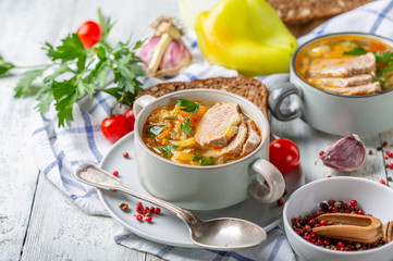 Soup of fresh cabbage, meat and fresh herbs.