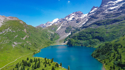 Naklejka na ściany i meble Wonderful nature and scenery in the Swiss Alps - Switzerland from above