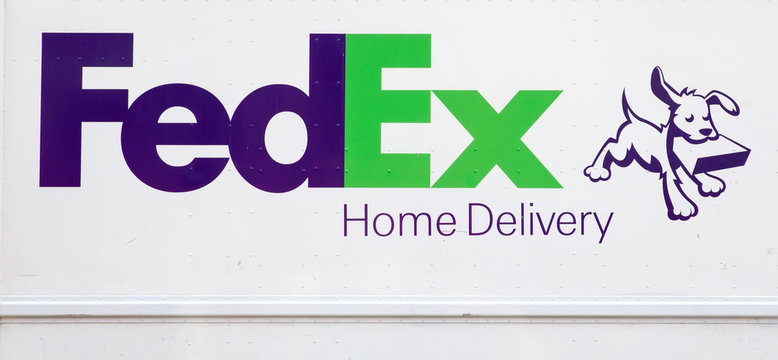 Detail from FedEx truck in New York, USA. FedEx Corporation is an American multinational courier delivery services company from Memphis, Tennessee, founded at 1971.