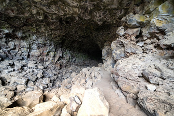Entry to the mouth of the Sentinal Cave in Lava Beds National Monument in California