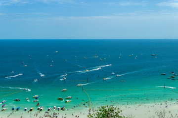  Clear blue sea with traffic and busy tourists Thailand near Pattaya