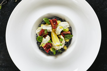 Black Risotto with Octopus and Sun Dried Tomatoes