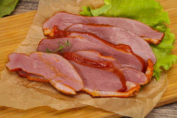 Sliced smoked duck breast served salad