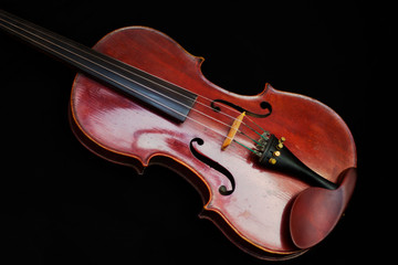 violin isolated on black background