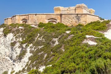 Marsaxlokk. The old stone tower of St. Lucian.