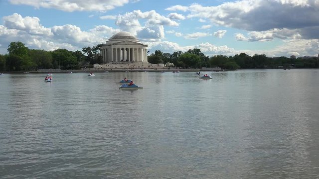 Jefferson Memorialat on the Tidal Basin shore  with a take-off plane at background. Washington, D.C., USA.