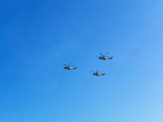 Airshow. Three AW139 in the blue sky