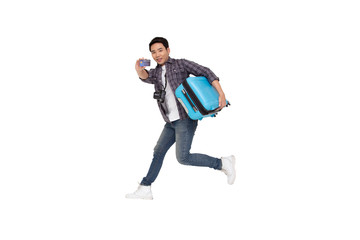 Young Asian man jumping with suitcase and credit card isolated on white background, Traveling and tour concept