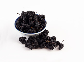 dried black berries group on white background