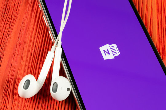 Helsinki, Finland, May 4, 2019: Microsoft OneNote office application icon on Apple iPhone X screen close-up. Microsoft One Note app icon. Microsoft OneNote application. Social media network