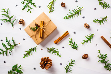 Fototapeta na wymiar Christmas composition. Christmas tree and gift box pattern background.