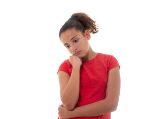 indoor portrait of a thoughtful young girl isolated on white background