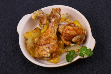 Roasted chicken legs with potato