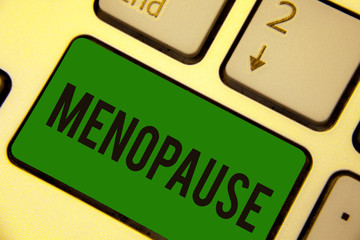 Writing note showing Menopause. Business photo showcasing Period of permanent cessation or end of menstruation cycle Keyboard green key Intention computer computing reflection document