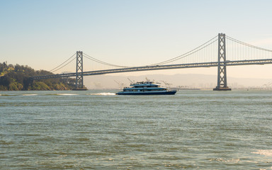 View of the Oakland Bay Bridge on a clear sunny day, San Francisco, California