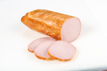 Tasty meat sausages over white background