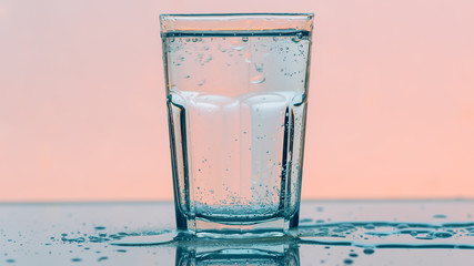 Carbonated soda water in drinking glass