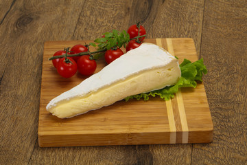 Brie cheese triangle served salad