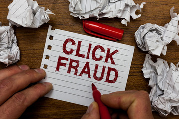Writing note showing Click Fraud. Business photo showcasing practice of repeatedly clicking on...