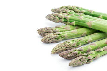 Fresh green asparagus on white