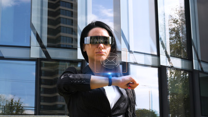 Innovation, technology and user concept. Woman using smart watch with digital business interface. Innovation, technology and user concept. 3D Rendering