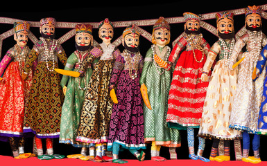 Colorful Indian puppets at local market in Jaipur city palace, India