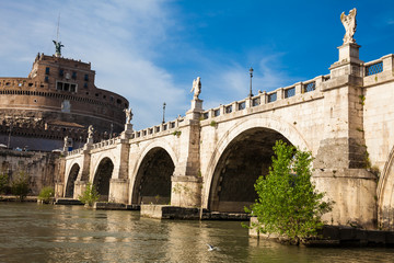 Fototapeta na wymiar Sant Angelo Bridge over the Tiber River completed in 134 AD by the Emperor Hadrian