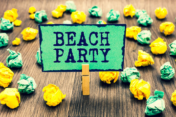 Text sign showing Beach Party. Conceptual photo small or big festival held on sea shores usually wearing bikini Clothespin holding green note paper crumpled papers several tries mistakes