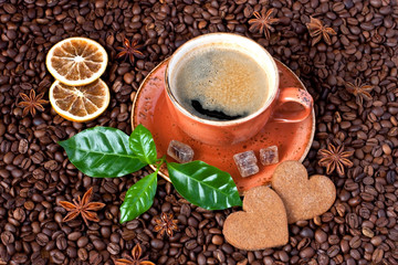 Still life with coffee cup,  cookies  and fresh leaves  on dark background