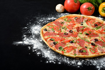 Italian pizza, with sausage and cheese, mushrooms and peppers