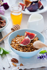 Homemade granola with fresh figs for breakfast