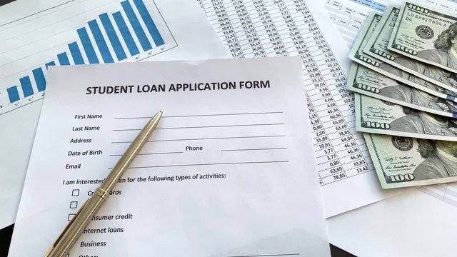 Student loan application form document on table