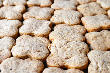 Nuts cookies. Close-up of a lot of peanut cookies background.
