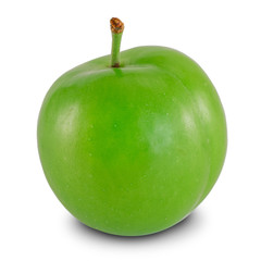 Fresh green plum close-up. Isolated on white background.