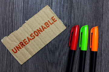 Word writing text Unreasonable. Business concept for Beyond the limits of acceptability or fairness...