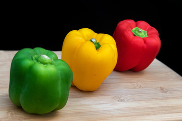 Three healthy and organic colorful peppers