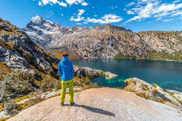 Girl standing above Laguna Churup, acclimatization hike, Huaraz trek, Cordillera Blanca, Peru, South America © Jan