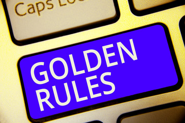 Conceptual hand writing showing Golden Rules. Business photo showcasing Basic principle that should be followed Important Principle Keyboard blue key Intention computer reflection document