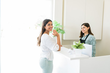 Beautiful Customer With Cosmetician At Spa