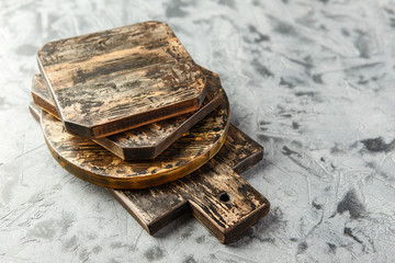 Set of different old wooden chopping boards