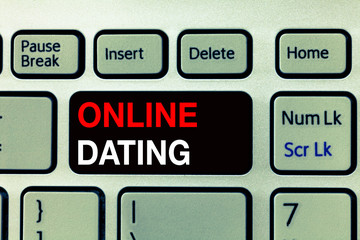 Fototapeta premium Conceptual hand writing showing Online Dating. Business photo text Searching Matching Relationships eDating Video Chatting.