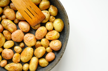 Golden roasted potatoes in the skin