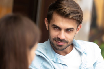 Naklejka premium Close up of millennial guy listen talking with female friend